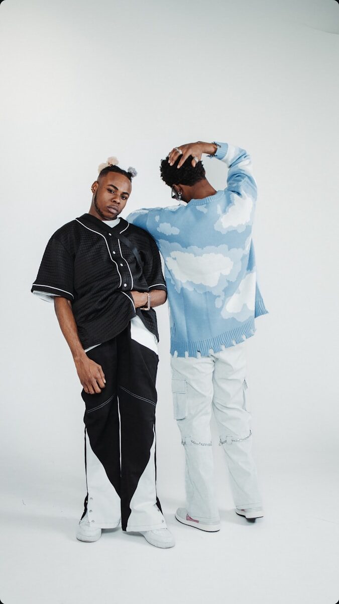 A couple of men standing next to each other